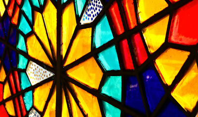 A beautiful stained glass window inside a church.